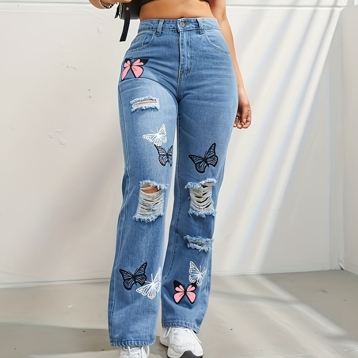 Ripped Distressed Denim with Butterfly Print - Daily Goods