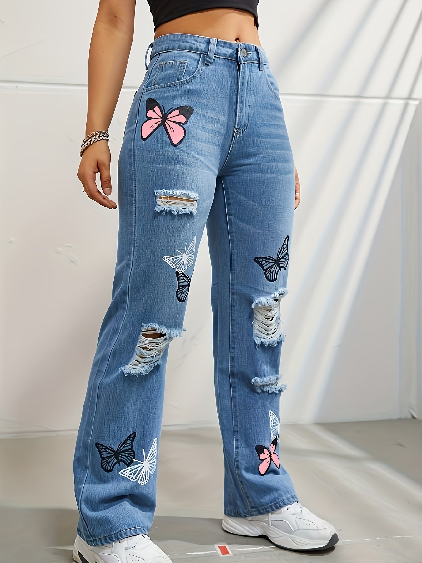Ripped Distressed Denim with Butterfly Print - Daily Goods
