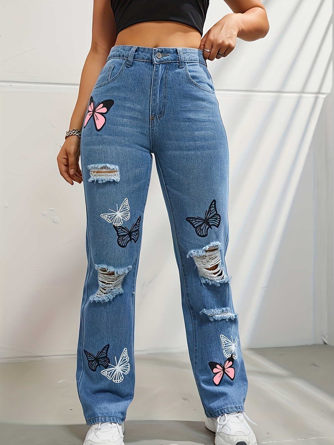 Ripped Distressed Denim with Butterfly Print - Daily Goods