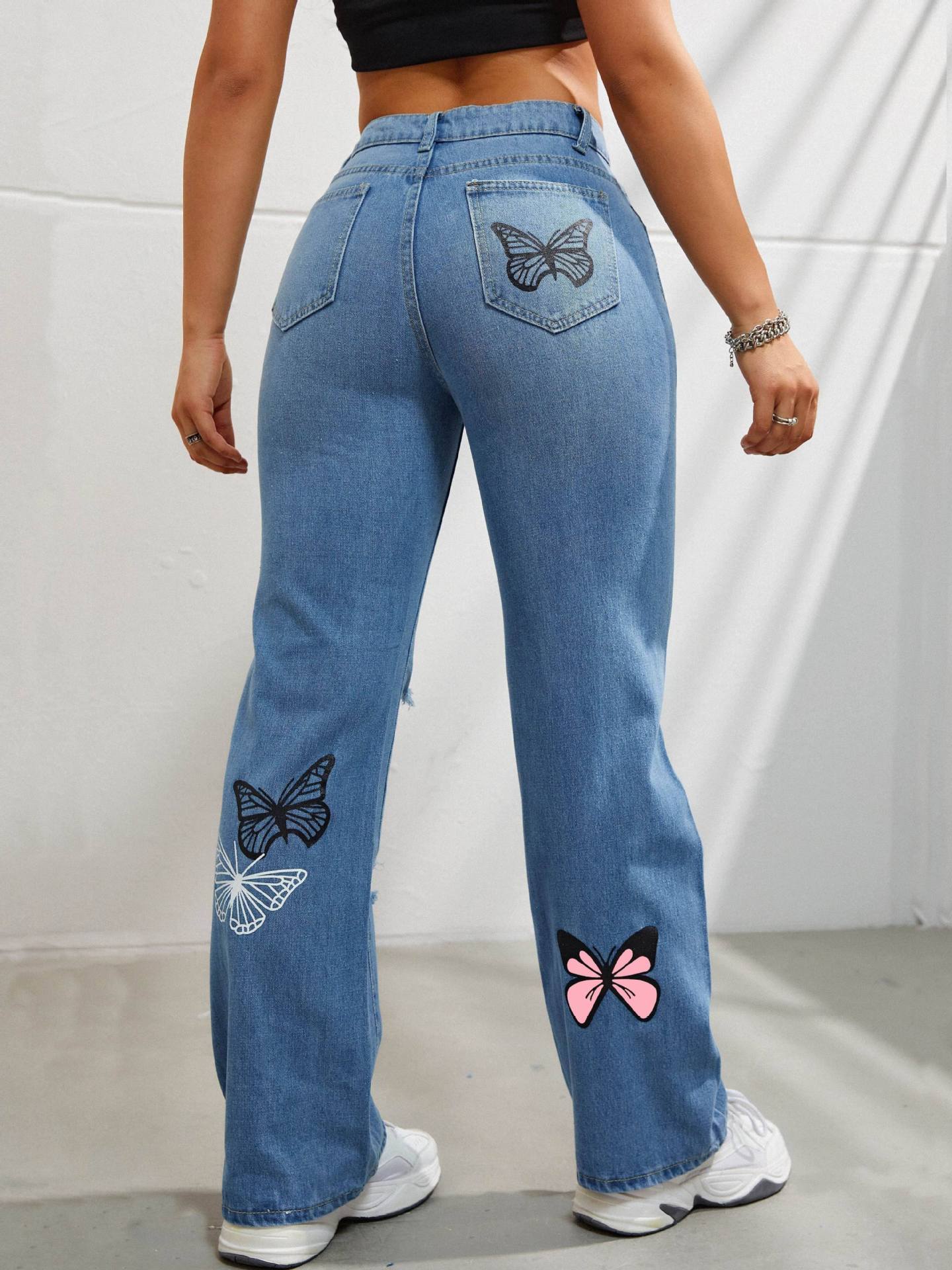 Ripped Distressed Denim with Butterfly Print - Daily Goods