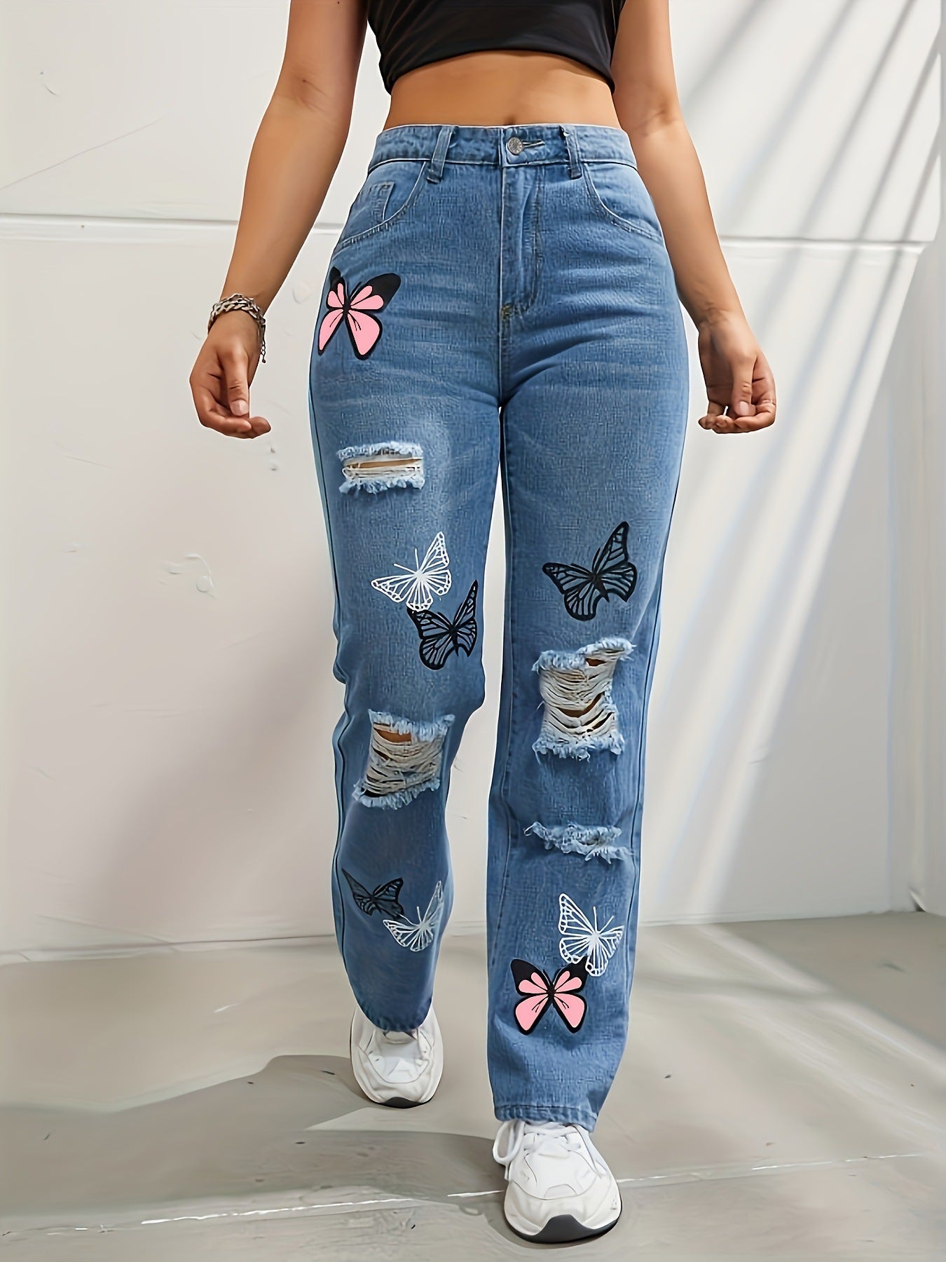 Ripped Distressed Denim with Butterfly Print - Daily Goods